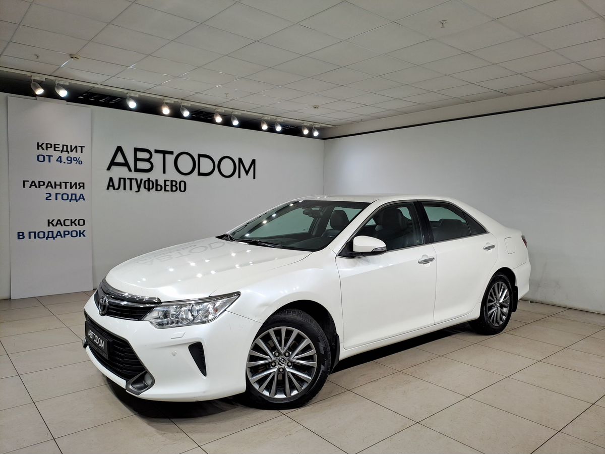 Автомобиль Toyota Camry VII (XV50) [рестайлинг] 2.5 AT (181 л.с.) Элеганс Плюс Белый 2016 с пробегом 318 258 км