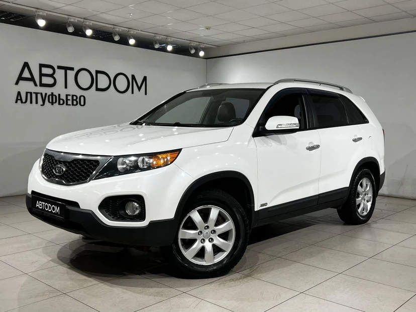 Kia Sorento II поколение 2.4 AT 4WD (175 л.с.) Luxe Белый 2012 с пробегом 173 355 км