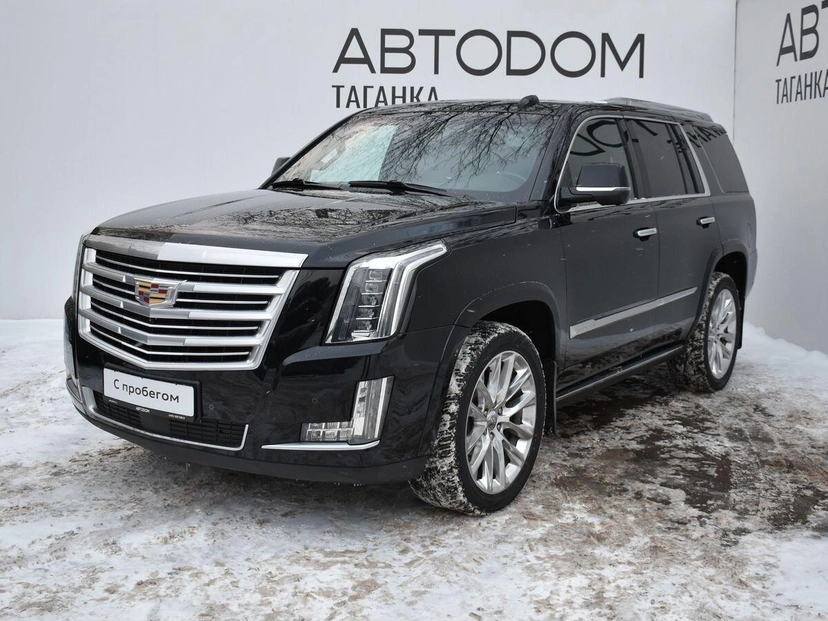 Автомобиль Cadillac Escalade IV поколение 6.2 AT 4WD (426 л.с.) Platinum Чёрный 2017 с пробегом 104 700 км