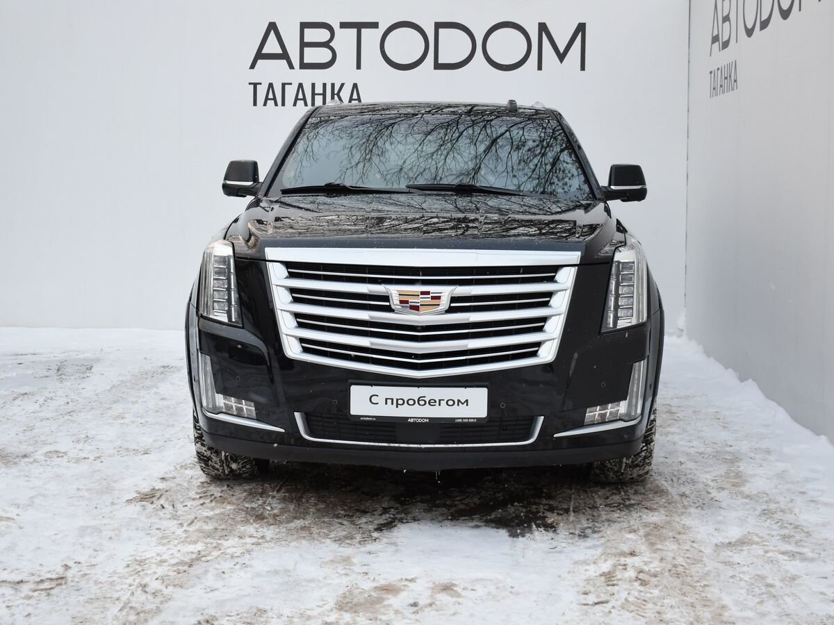 Автомобиль Cadillac Escalade IV поколение 6.2 AT 4WD (426 л.с.) Platinum Чёрный 2017 с пробегом 104 700 км