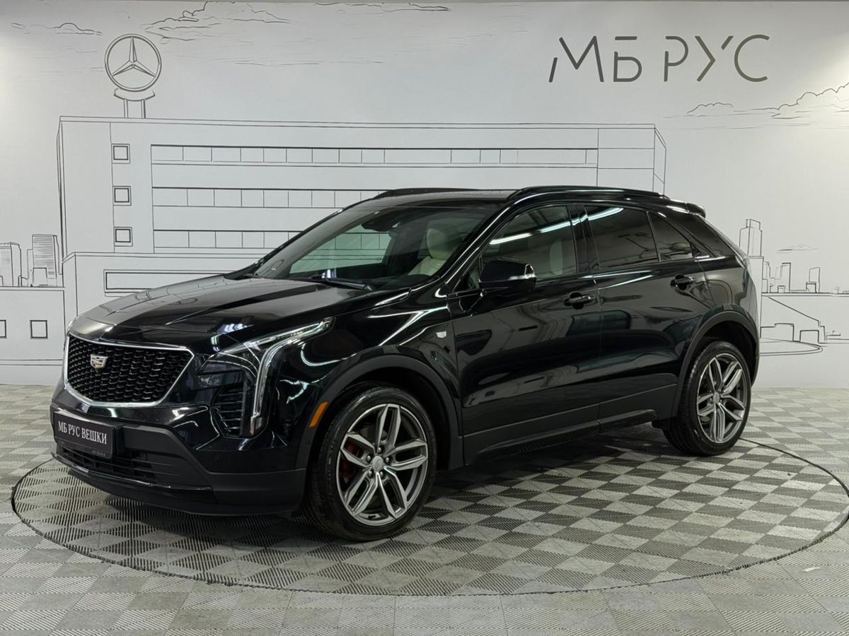 Автомобиль Cadillac XT4 I поколение 2.0 AT 4WD (200 л.с.) Sport Чёрный 2021 с пробегом 37 801 км