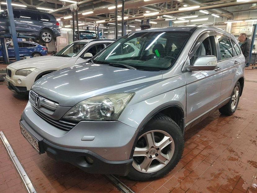 Автомобиль Honda CR-V III поколение 2.4 AT 4WD (166 л.с.) Executive Серебристый 2008 с пробегом 117 910 км
