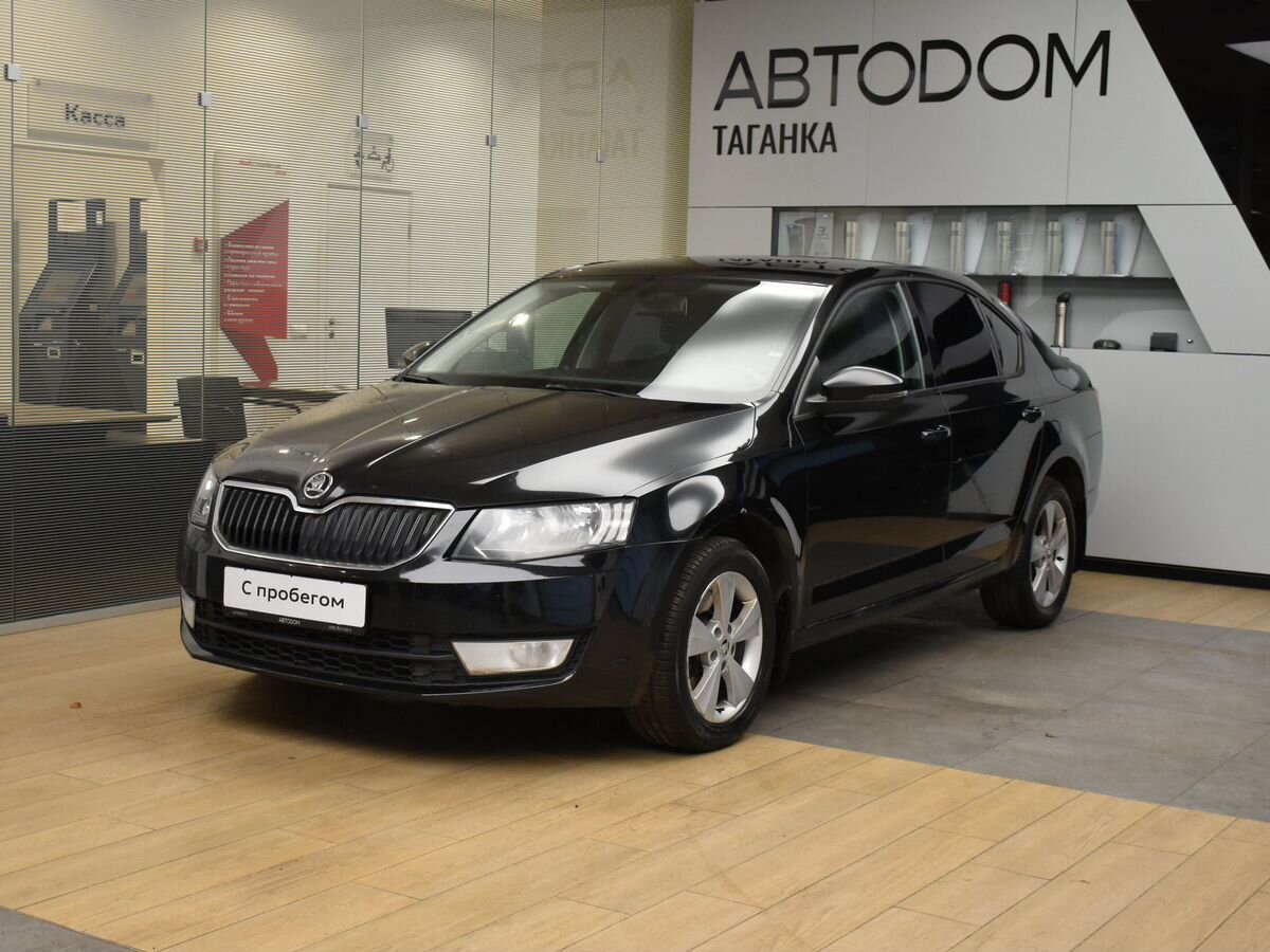 Автомобиль Skoda Octavia III поколение (A7) 1.8 MT (180 л.с.) Base Чёрный 2014 с пробегом 168 000 км