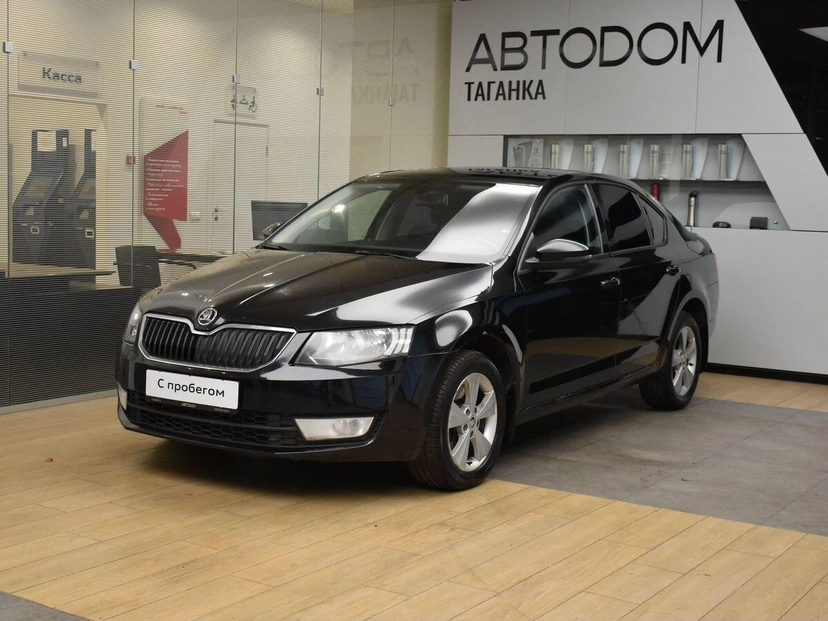 Автомобиль Skoda Octavia III поколение (A7) 1.8 MT (180 л.с.) Base Чёрный 2014 с пробегом 168 000 км