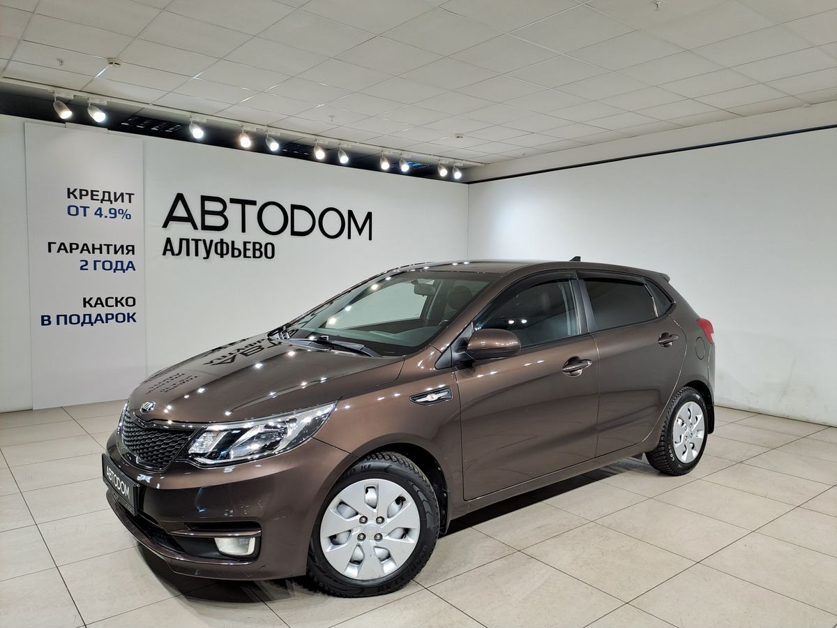 Автомобиль Kia Rio III [рестайлинг] 1.4 MT (107 л.с.) Comfort Кондиционер Коричневый 2017 с пробегом 59 881 км