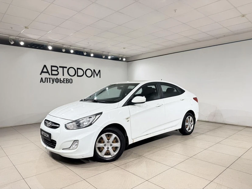Hyundai Solaris I поколение 1.6 AT (123 л.с.) Optima Белый 2013 с пробегом 250 400 км