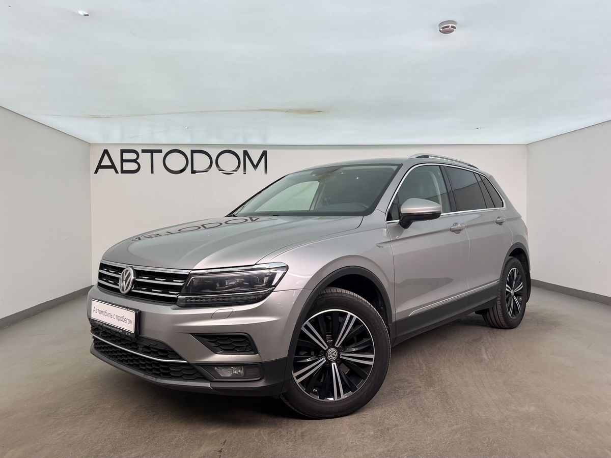 Volkswagen Tiguan II поколение 2.0 AMT 4WD (180 л.с.) Highline Серебристый 2018 с пробегом 99 350 км
