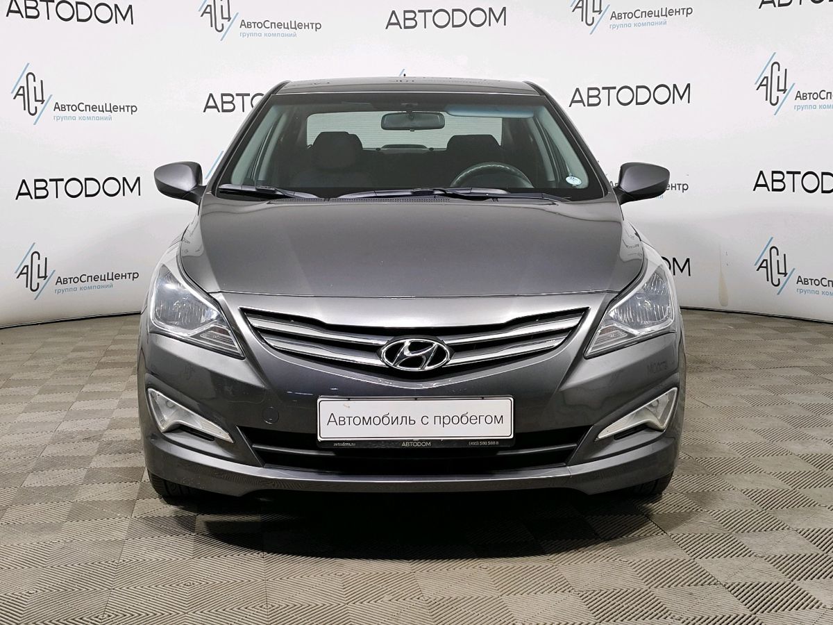 Автомобиль Hyundai Solaris I [рестайлинг] 1.6 AT (123 л.с.) Comfort Серый 2015 с пробегом 121 172 км