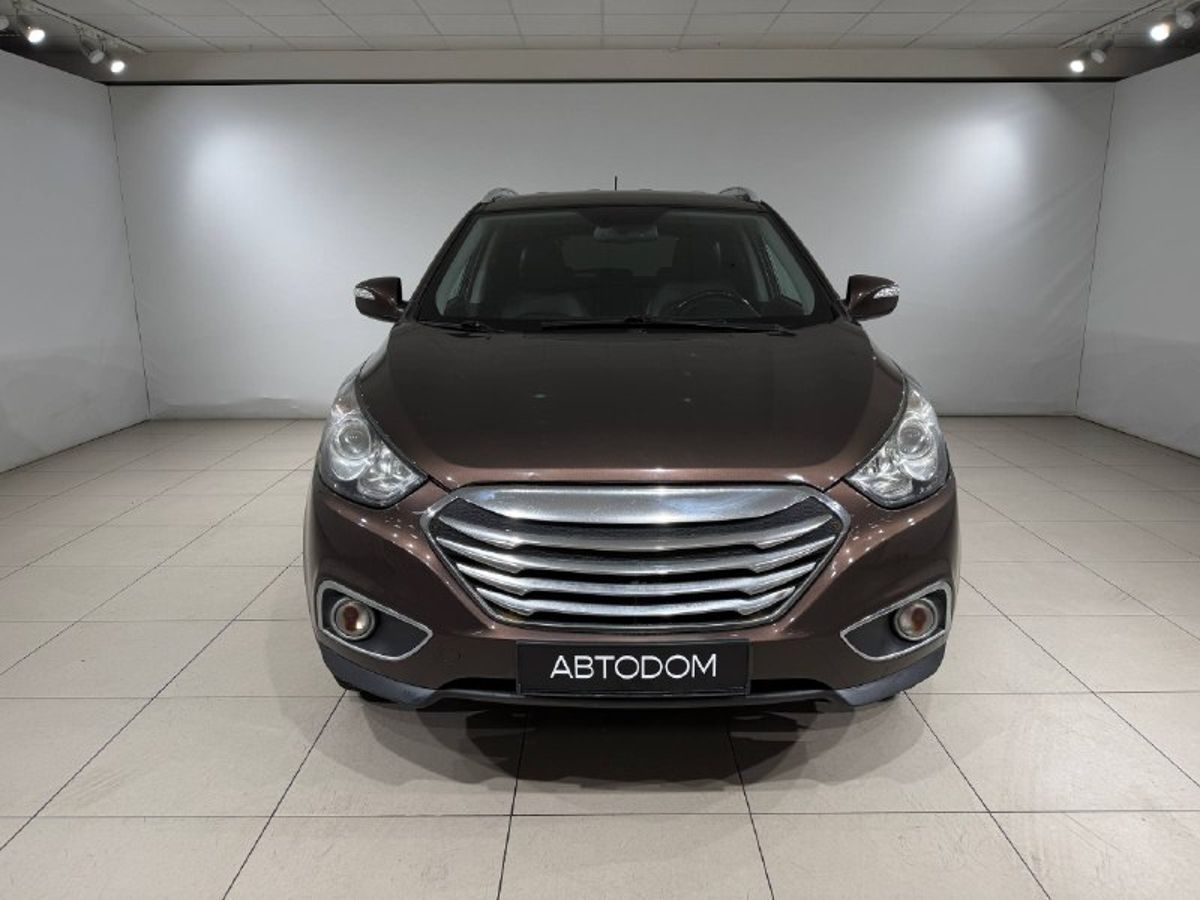 Автомобиль Hyundai ix35 I поколение 2.0 AT (150 л.с.) Comfort+Navi Коричневый 2013 с пробегом 200 038 км