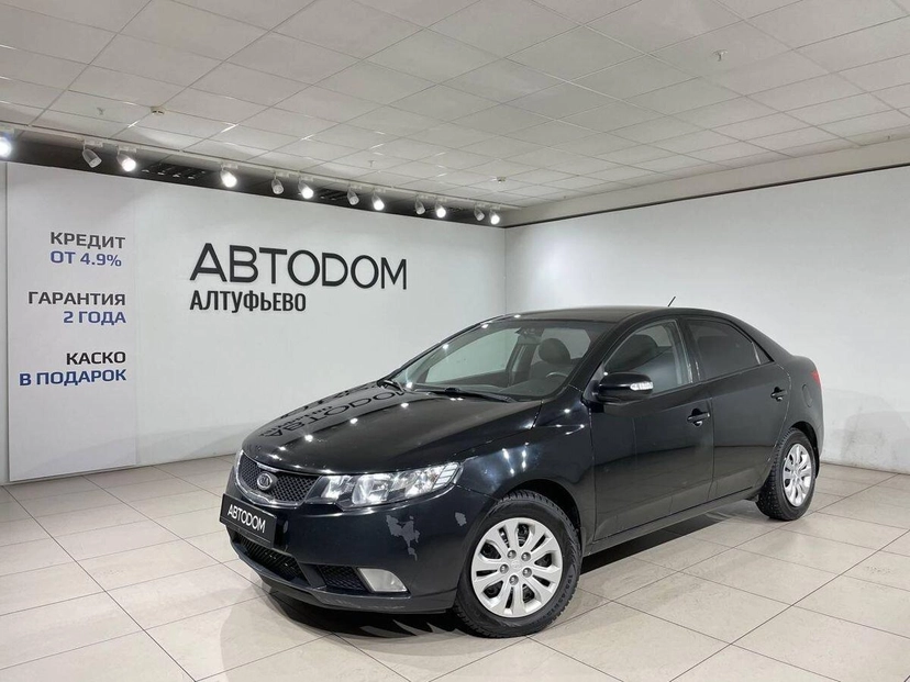Автомобиль Kia Cerato II поколение 4-speed 1.6 AT (126 л.с.) Base Чёрный 2009 с пробегом 150 018 км