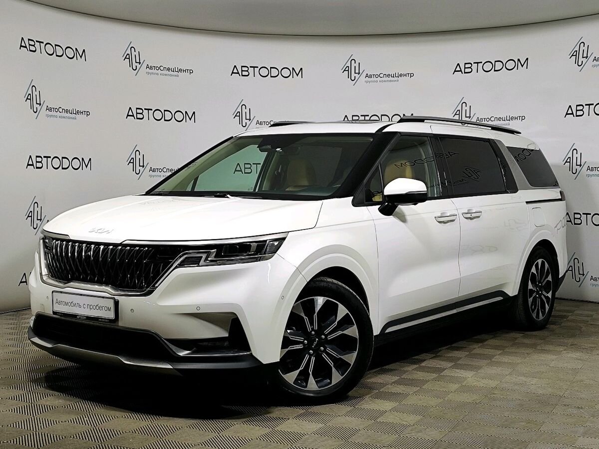 Автомобиль Kia Carnival IV поколение 2.2d AT (199 л.с.) Premium+ (2021) Белый 2023 с пробегом 70 356 км
