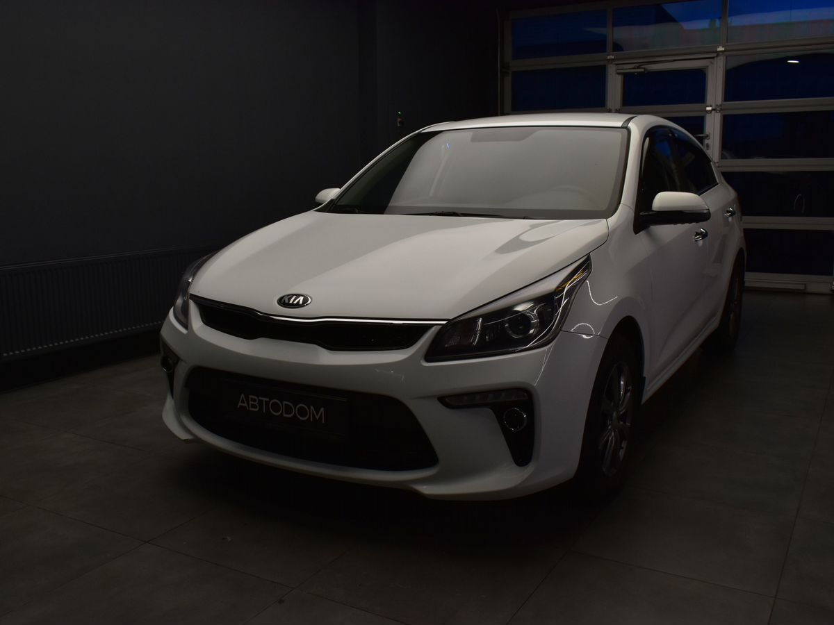 Kia Rio IV поколение 1.6 AT (123 л.с.) Premium Белый 2017 с пробегом 128 000 км