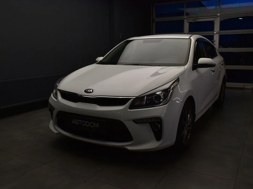 Kia Rio IV поколение 1.6 AT (123 л.с.) Premium Белый 2017 с пробегом 128 000 км