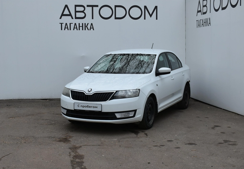 Автомобиль Skoda Rapid I поколение 1.6 MT (110 л.с.) Base Белый 2016 с пробегом 228 940 км