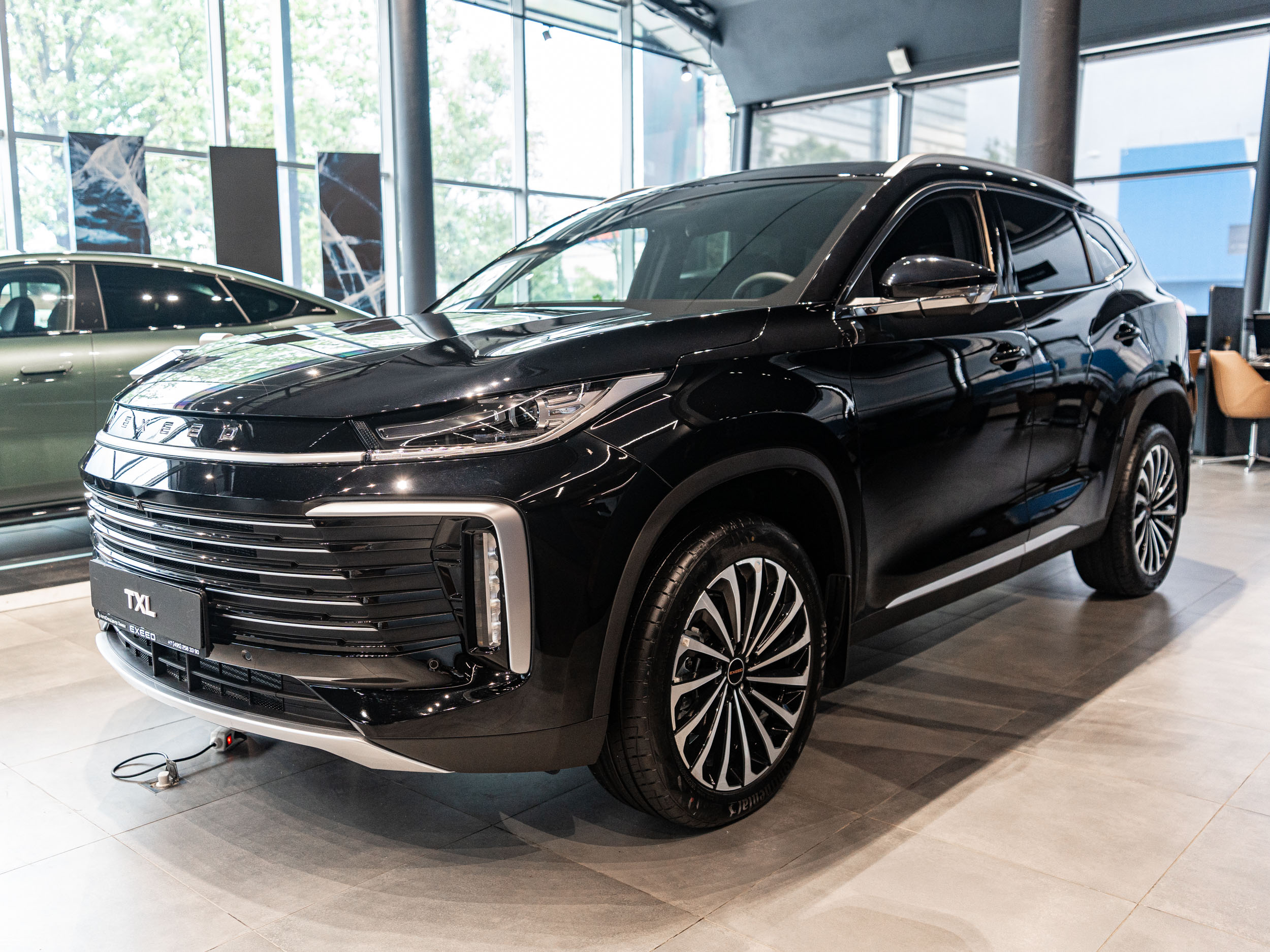 Автомобиль EXEED TXL I [2-й рестайлинг] 2.0 AT 4WD (197 л.с.) Flagship Чёрный 2024 