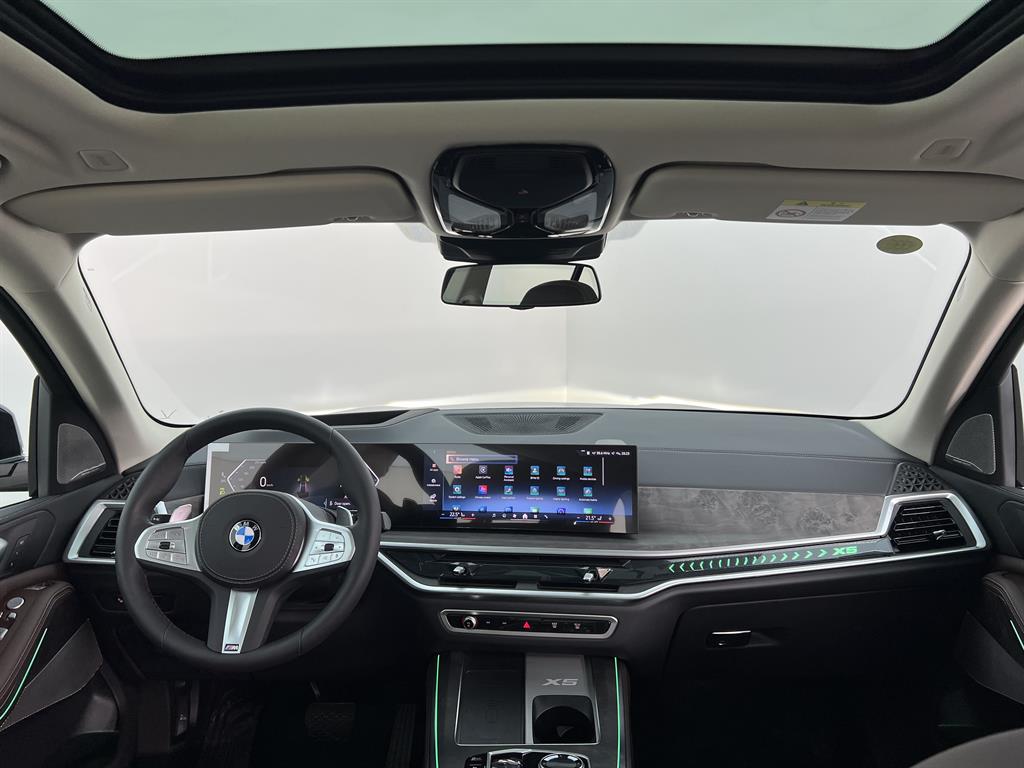 Автомобиль BMW X5 IV (G05) [рестайлинг] 2.0 AT 4WD (258 л.с.) Premium M Sport Синий 2025 