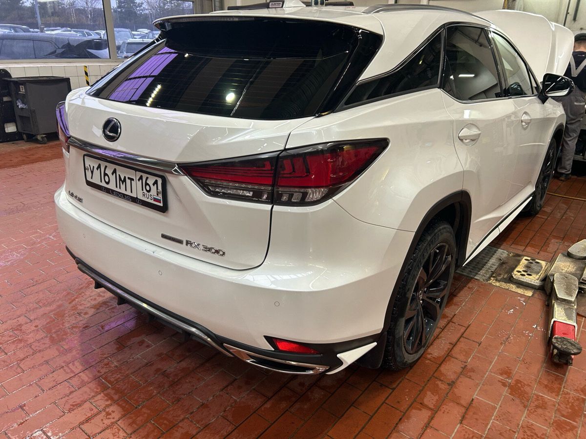 Lexus RX IV [рестайлинг] 2.0 AT 4WD (238 л.с.) Base Чёрный 2021 с пробегом 73 341 км