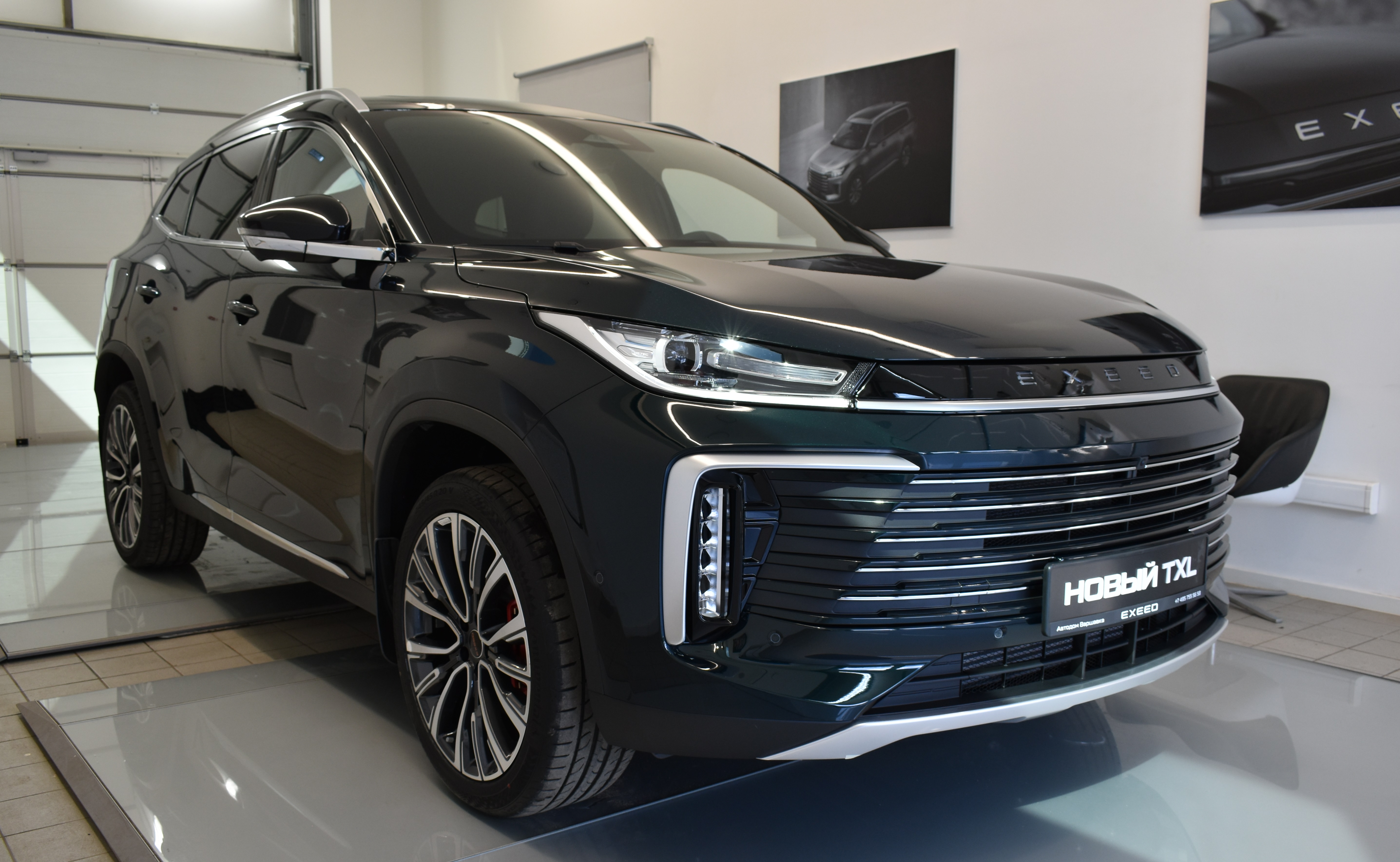 Автомобиль EXEED TXL I [2-й рестайлинг] 1.6 AMT 4WD (194 л.с.) Prestige Зелёный 2025 