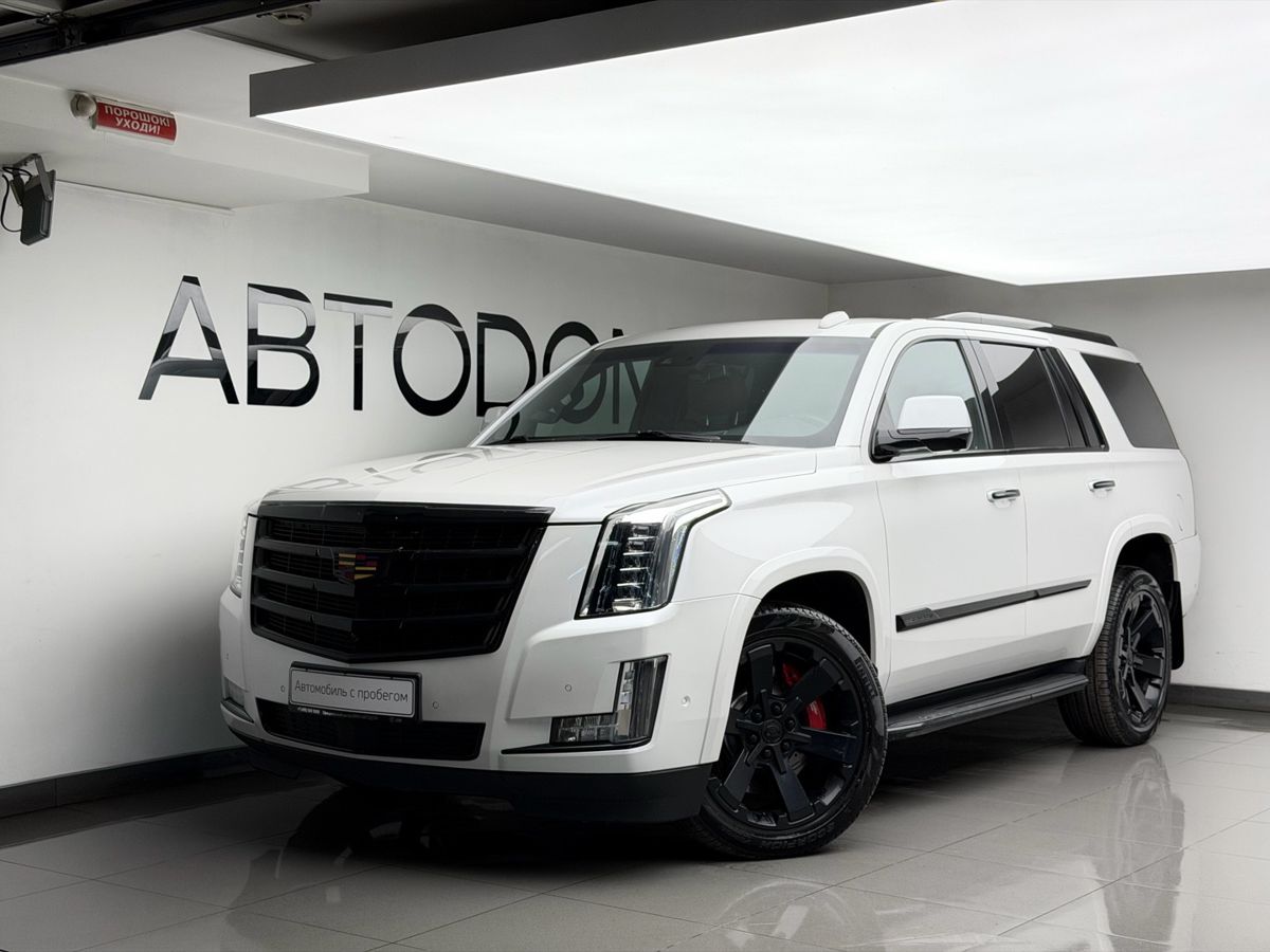 Cadillac Escalade IV поколение 6.2 AT 4WD (426 л.с.) Premium ESV Белый 2018 с пробегом 153 680 км