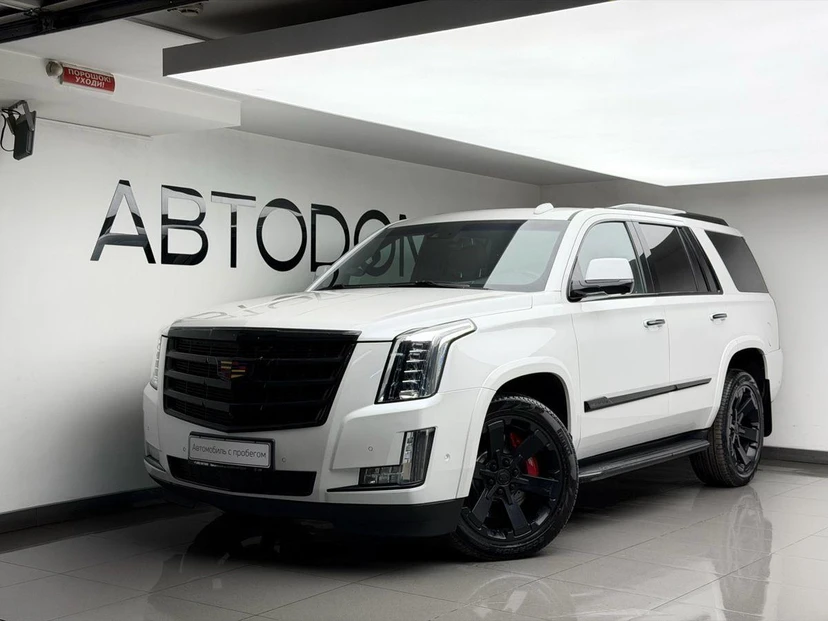 Cadillac Escalade IV поколение 6.2 AT 4WD (426 л.с.) Premium ESV Белый 2018 с пробегом 153 680 км