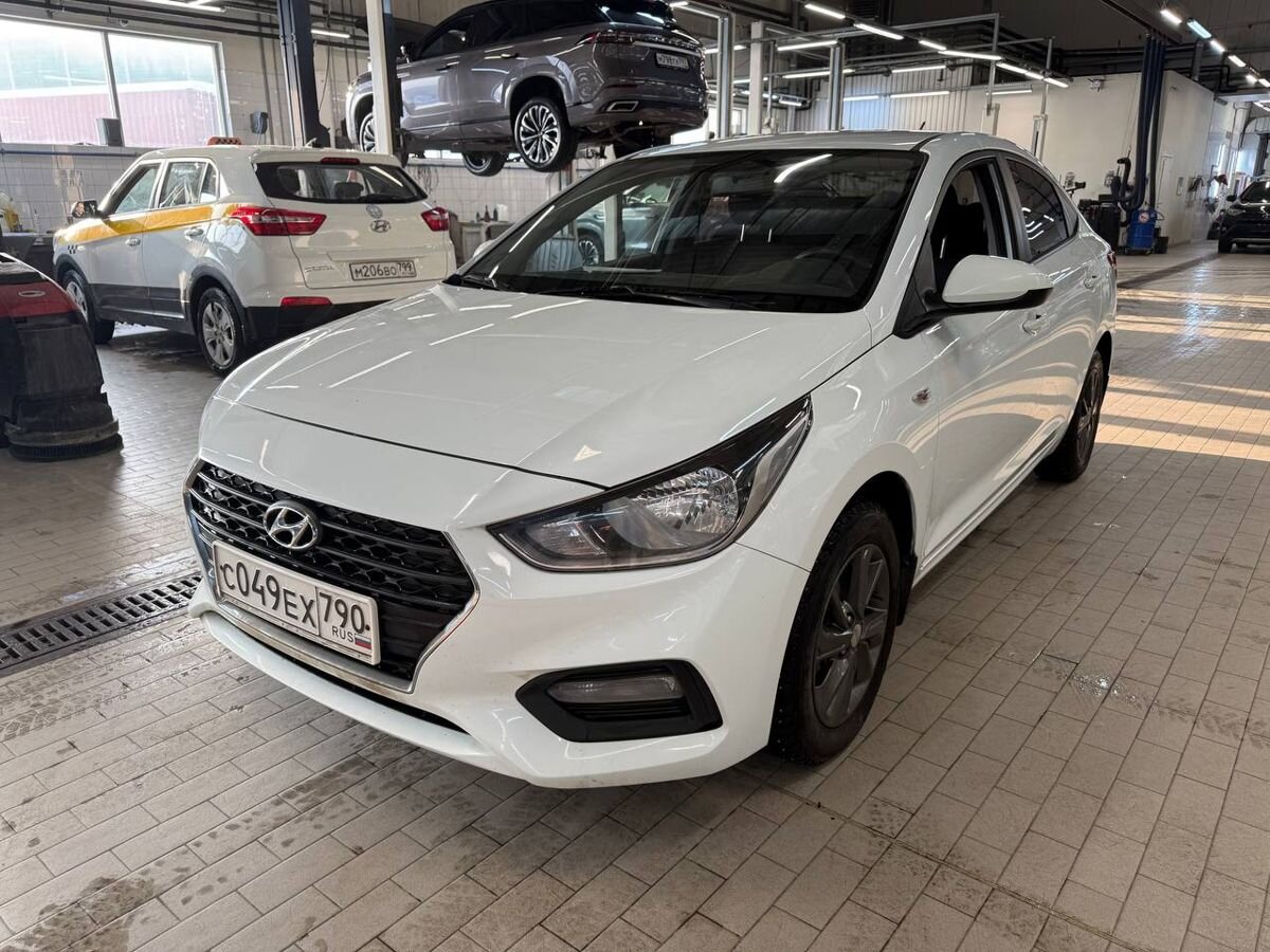 Автомобиль Hyundai Solaris II поколение 1.6 AT (123 л.с.) Comfort + Advanced Белый 2018 с пробегом 81 323 км