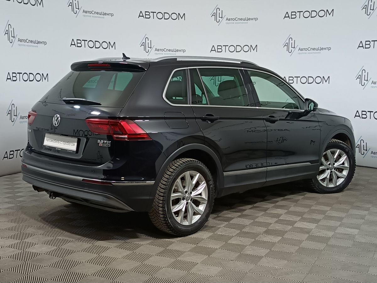 Автомобиль Volkswagen Tiguan II поколение 2.0 AMT 4WD (180 л.с.) Sportline Чёрный 2017 с пробегом 155 089 км
