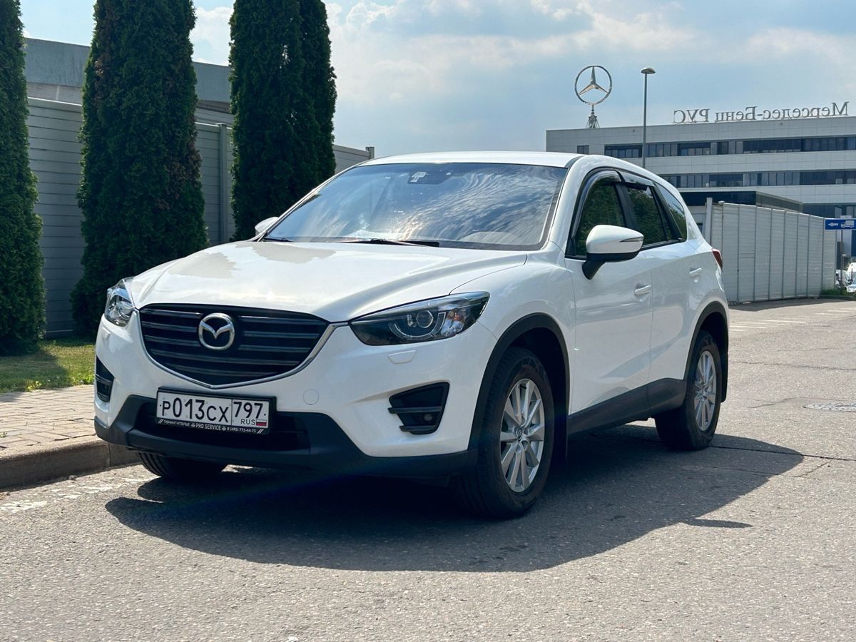 Mazda CX-5 I [рестайлинг] 2.0 AT (150 л.с.) Active Белый 2015 с пробегом 95 000 км