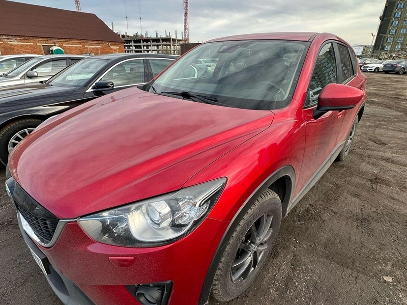 Автомобиль Mazda CX-5 I поколение 2.5 AT 4WD (192 л.с.) Supreme Красный 2014 с пробегом 113 000 км