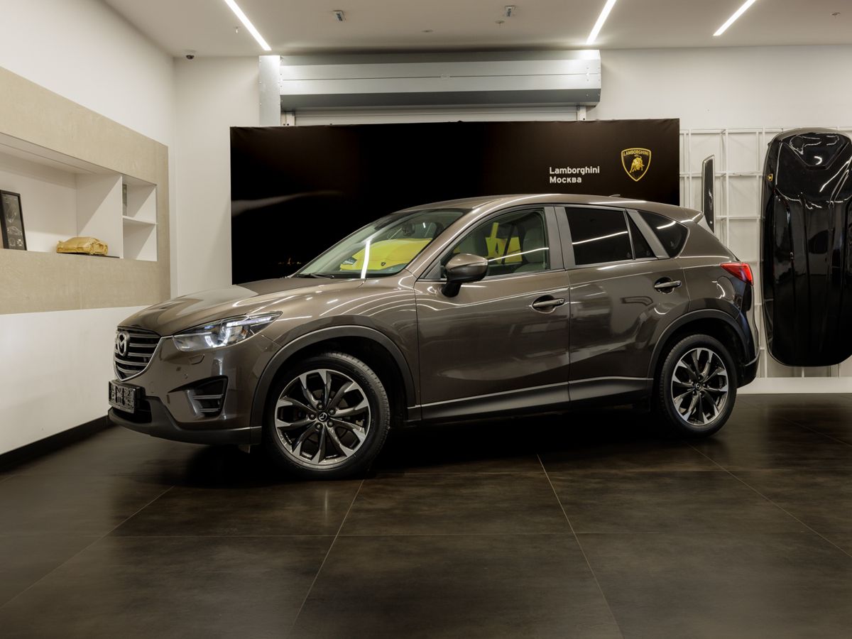 Mazda CX-5 I [рестайлинг] 2.0 AT 4WD (150 л.с.) Supreme Коричневый 2016 с пробегом 99 000 км