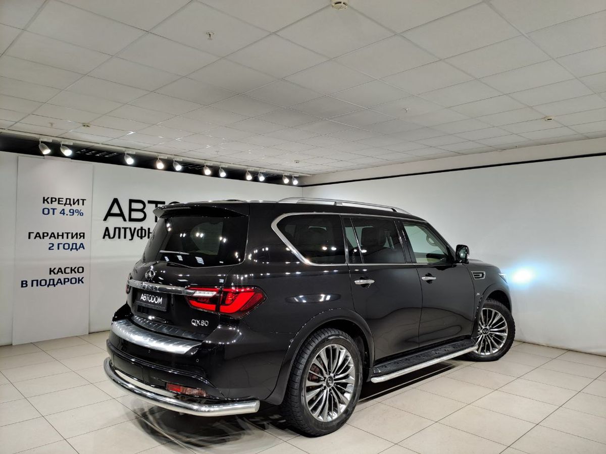 Автомобиль Infiniti QX80 I (Z62) [2-й рестайлинг] 5.6 AT 4WD (405 л.с.) Luxe Sensory Proactive 8-местный Чёрный 2019 с пробегом 102 244 км