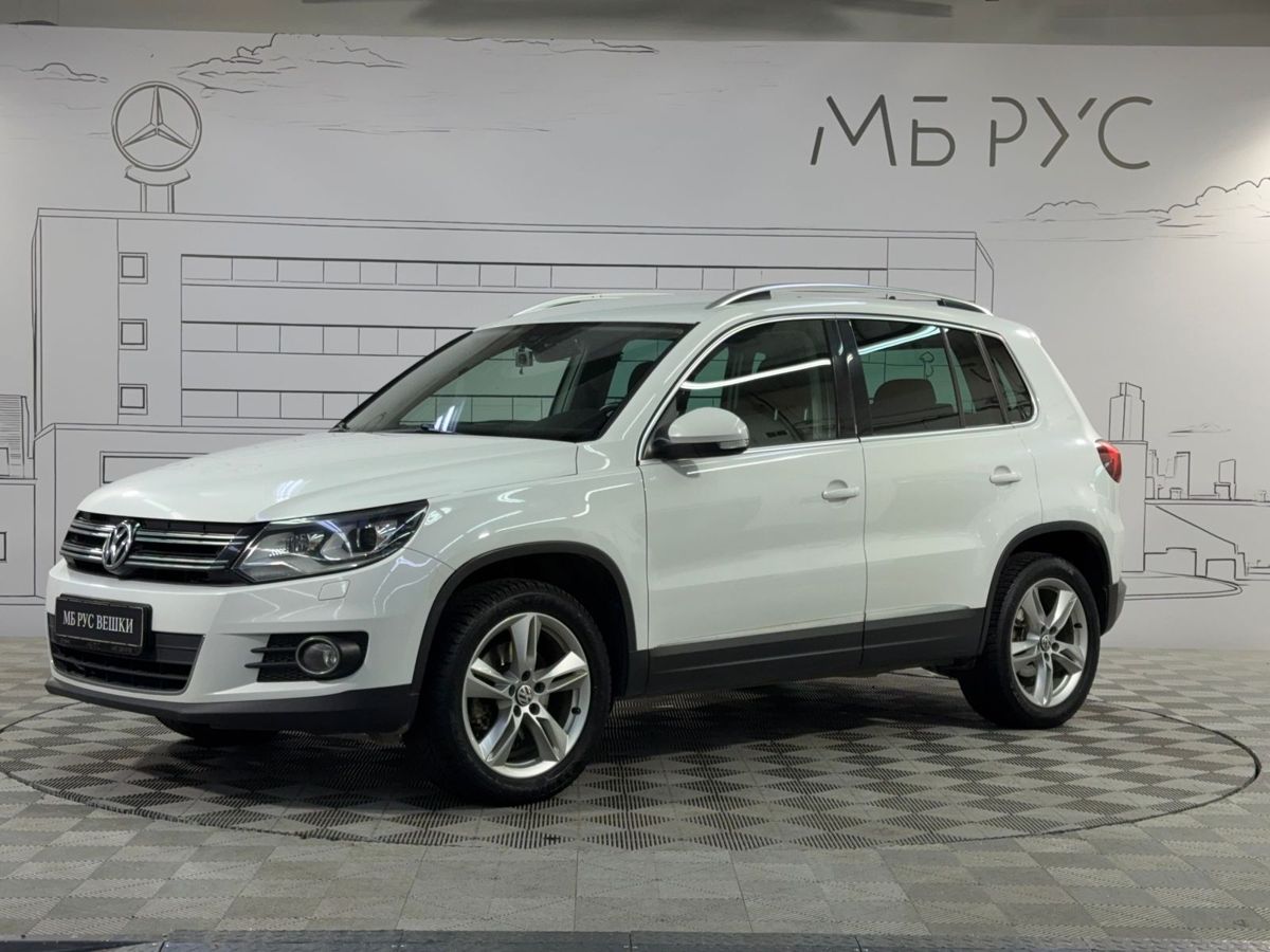 Volkswagen Tiguan I [рестайлинг] 2.0 AMT 4WD (210 л.с.) Sport Белый 2015 с пробегом 193 971 км