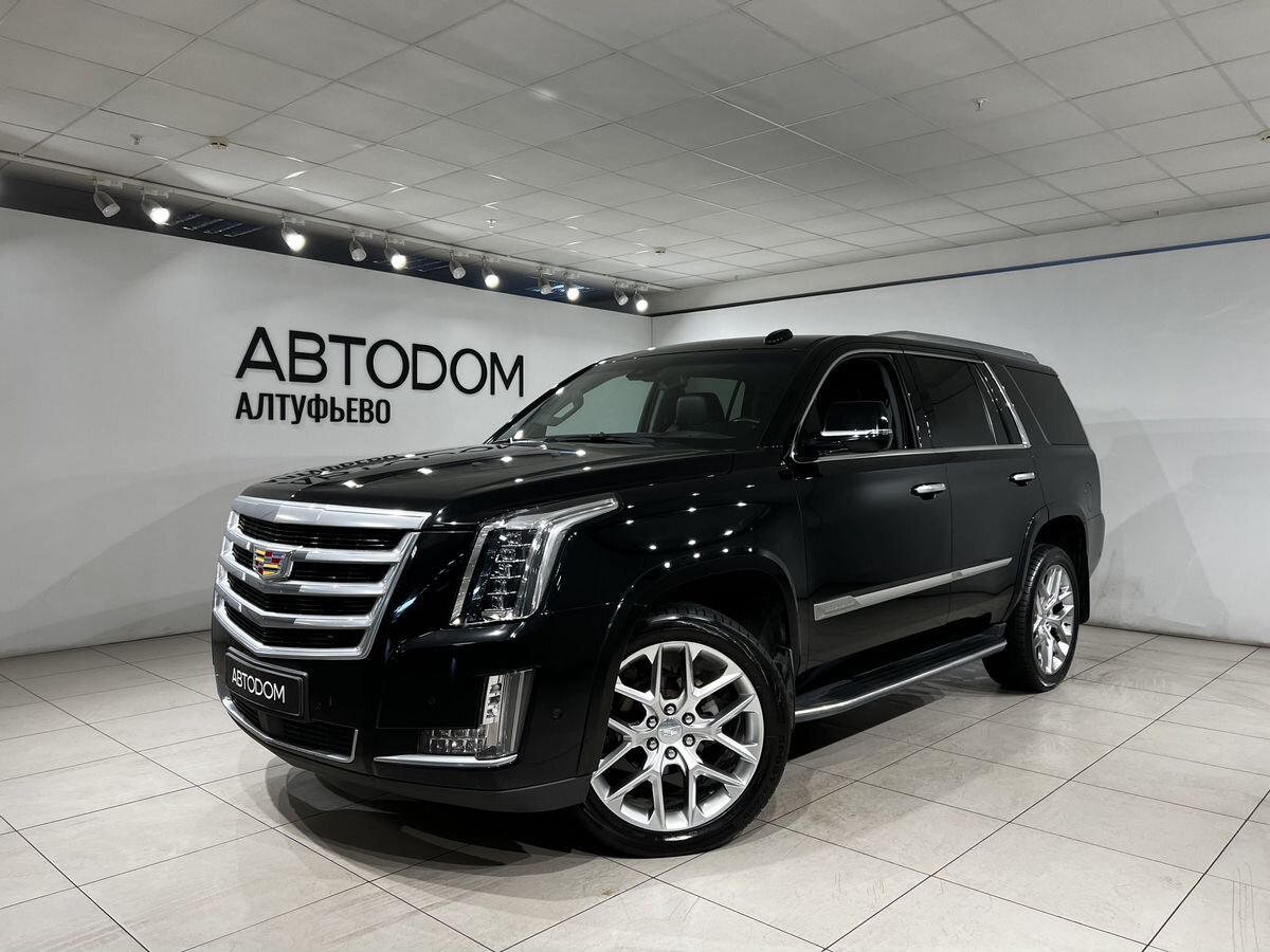Cadillac Escalade IV поколение 6.2 AT 4WD (426 л.с.) Luxury Чёрный 2017 с пробегом 142 894 км