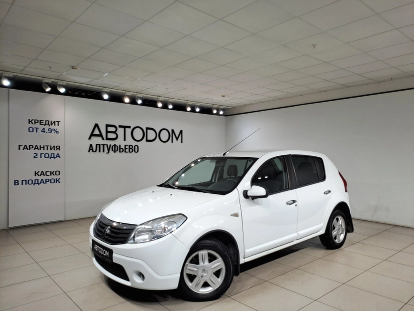 Автомобиль Renault Sandero I поколение 1.6 AT (103 л.с.) Base Белый 2011 с пробегом 70 303 км