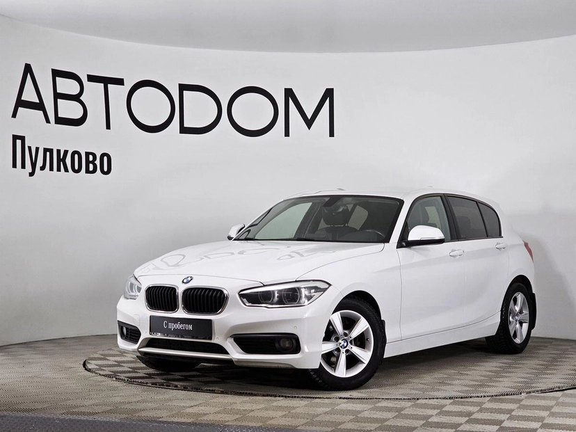 Автомобиль BMW 1 серии II (F20/F21) [рестайлинг] 118 1.5 AT (136 л.с.) Base Белый 2016 с пробегом 146 000 км