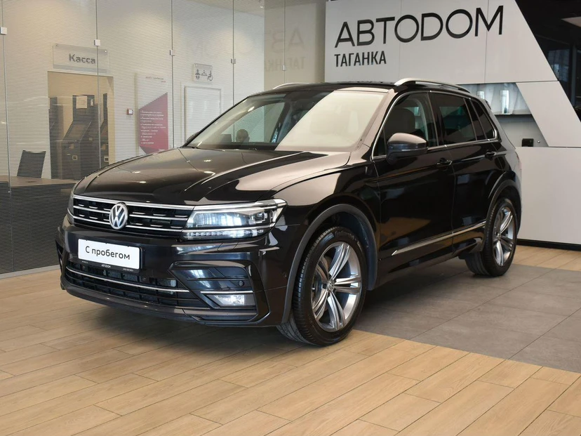 Volkswagen Tiguan II поколение 2.0 AMT 4WD (180 л.с.) Sportline Чёрный 2018 с пробегом 143 147 км