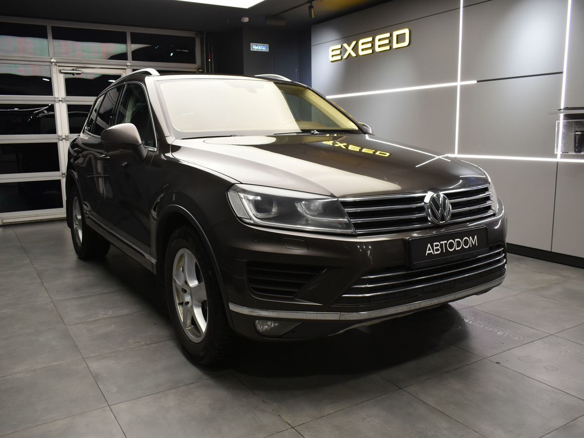 Автомобиль Volkswagen Touareg II [рестайлинг] 3.6 AT 4WD (249 л.с.) Base Коричневый 2015 с пробегом 303 557 км