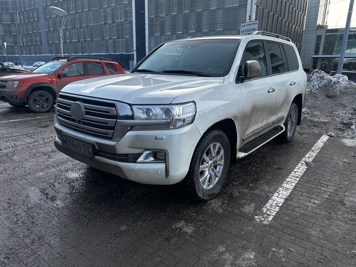 Автомобиль Toyota Land Cruiser IX (J200) [2-й рестайлинг] 4.5d AT 4WD (249 л.с.) Люкс Safety (5 мест) Белый 2019 с пробегом 144 379 км