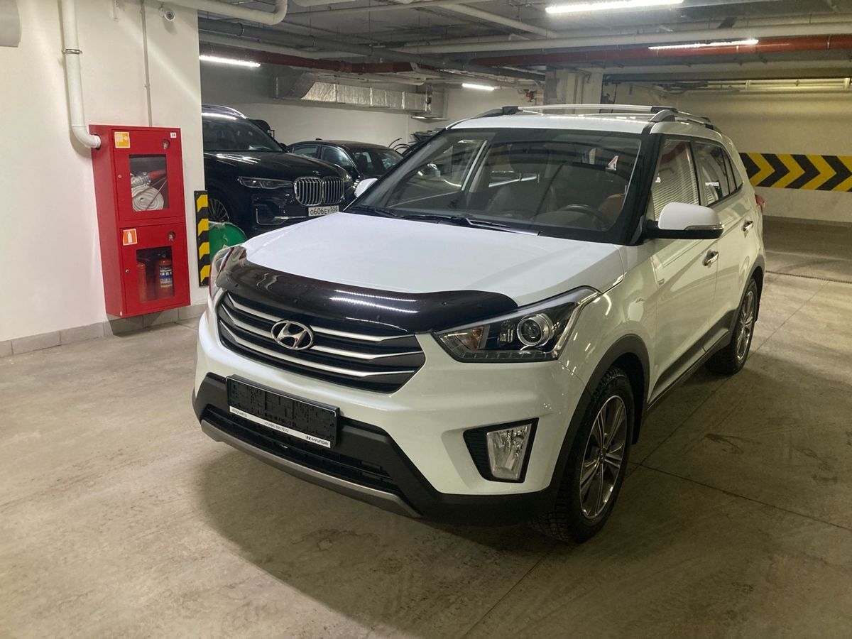 Автомобиль Hyundai Creta I поколение 2.0 AT 4WD (149 л.с.) Travel + Advanced + Style Белый 2018 с пробегом 39 300 км