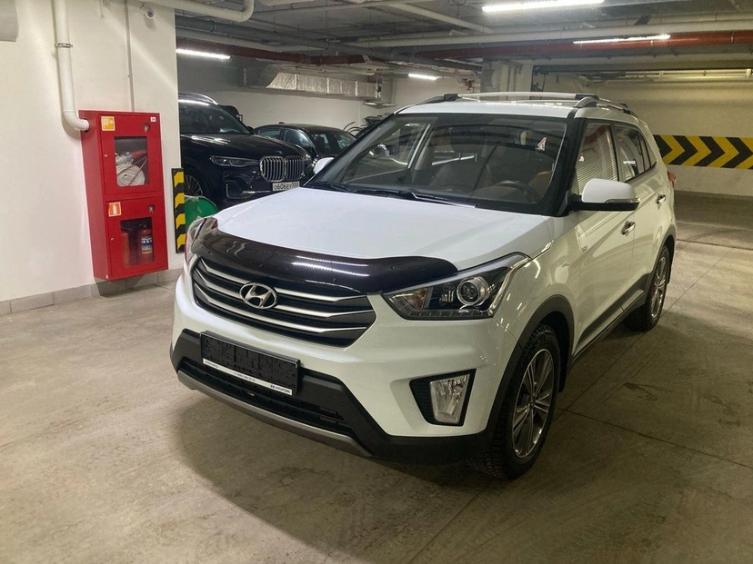 Автомобиль Hyundai Creta I поколение 2.0 AT 4WD (149 л.с.) Travel + Advanced + Style Белый 2018 с пробегом 39 300 км