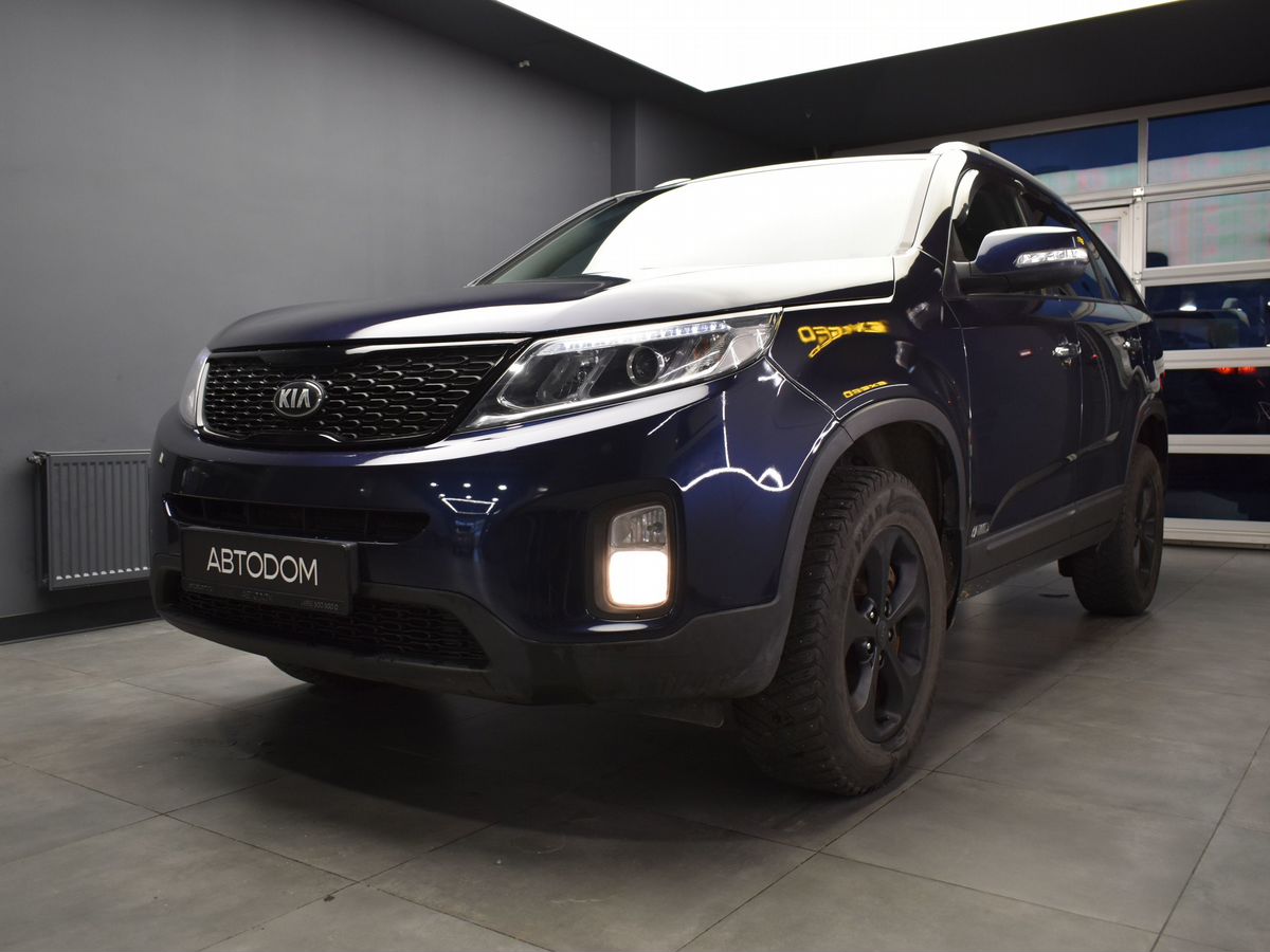 Kia Sorento II [рестайлинг] 2.4 AT 4WD (175 л.с.) Comfort Синий 2014 с пробегом 241 232 км