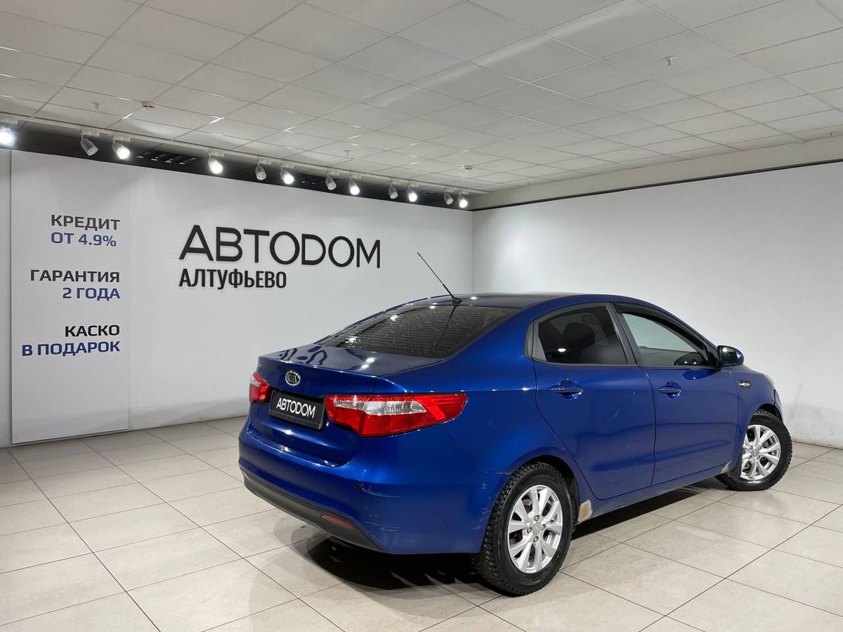 Автомобиль Kia Rio III поколение 1.4 AT (107 л.с.) Comfort Синий 2012 с пробегом 198 214 км