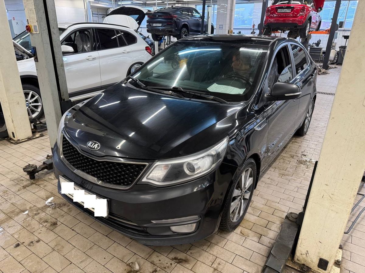 Автомобиль Kia Rio III [рестайлинг] 1.6 AT (123 л.с.) Prestige Чёрный 2016 с пробегом 194 301 км
