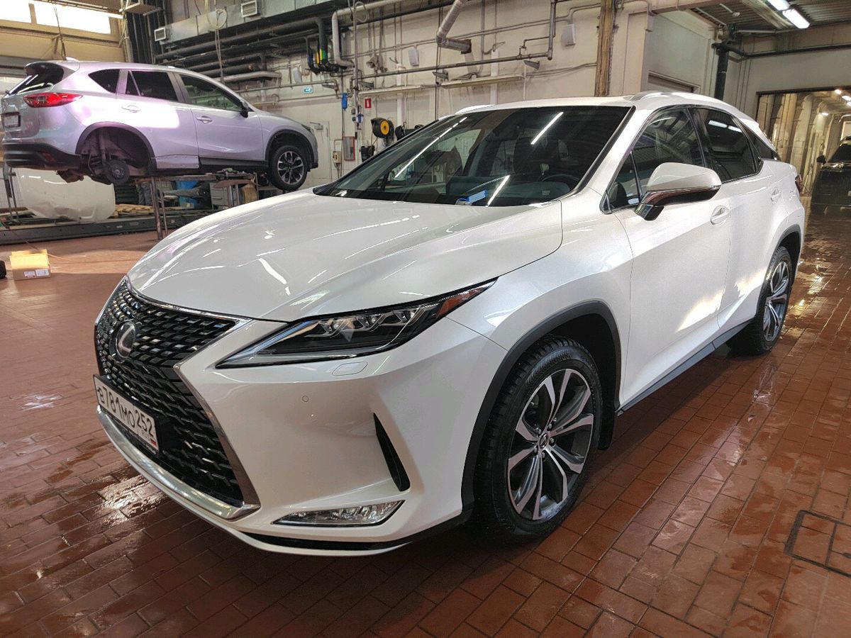 Автомобиль Lexus RX IV [рестайлинг] 2.0 AT 4WD (238 л.с.) F Sport Белый 2020 с пробегом 80 104 км