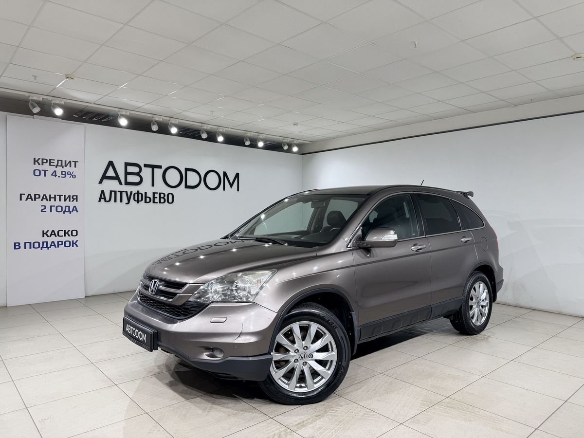 Honda CR-V III [рестайлинг] 2.4 AT 4WD (166 л.с.) Executive Серебристый 2012 с пробегом 239 000 км