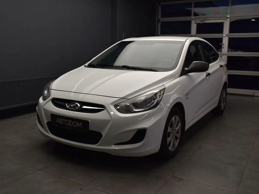 Hyundai Solaris I поколение 1.6 AT (123 л.с.) Classic Белый 2014 с пробегом 149 710 км